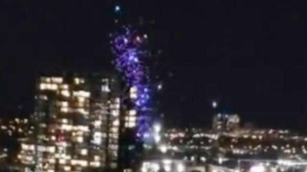 Supplied Editorial In videos posted to social media, dro<em></em>nes were seen falling out of
 formation and into the Yarra River in Docklands on Friday night. Pictures:
 Channel 9